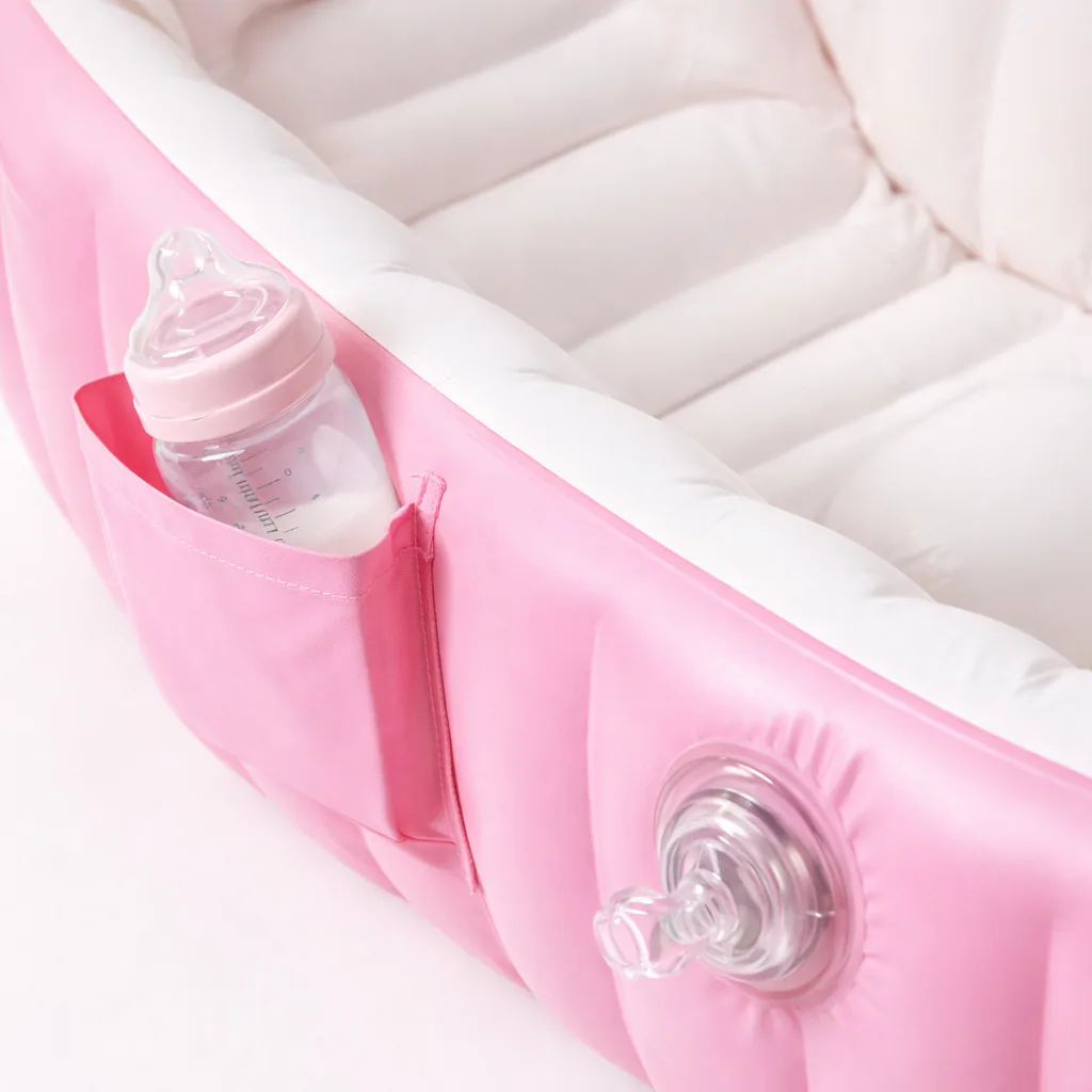 Bolsillo lateral con tetero y válvula de aire de la bañera rosa