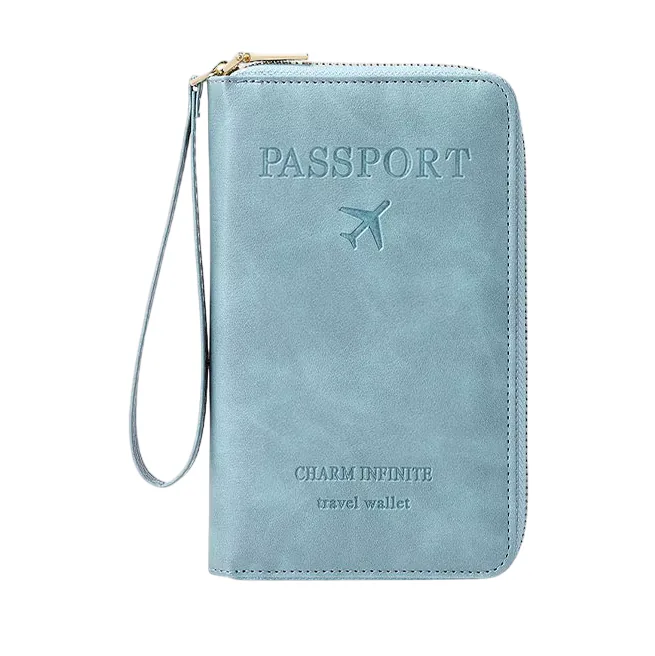 Billetera porta pasaporte azul claro con cremallera y correa de muñeca