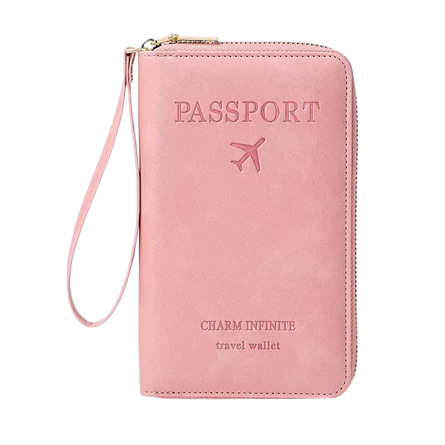 Billetera porta pasaporte rosa con cremallera y correa de muñeca
