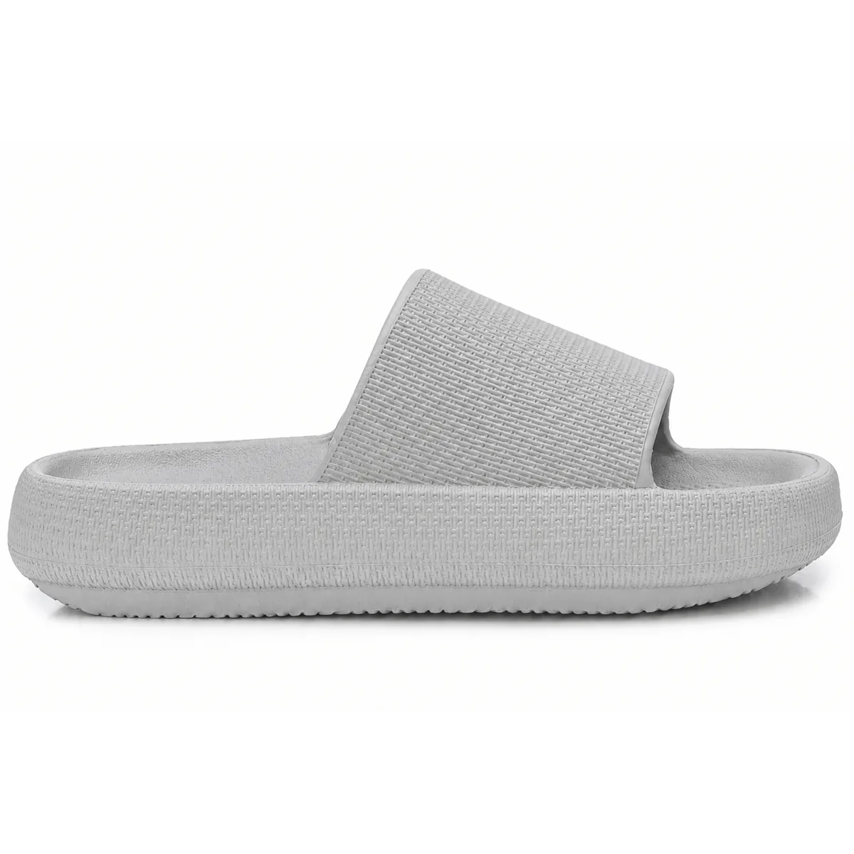 Pantufla tipo nube gris con suela gruesa, vista de lado