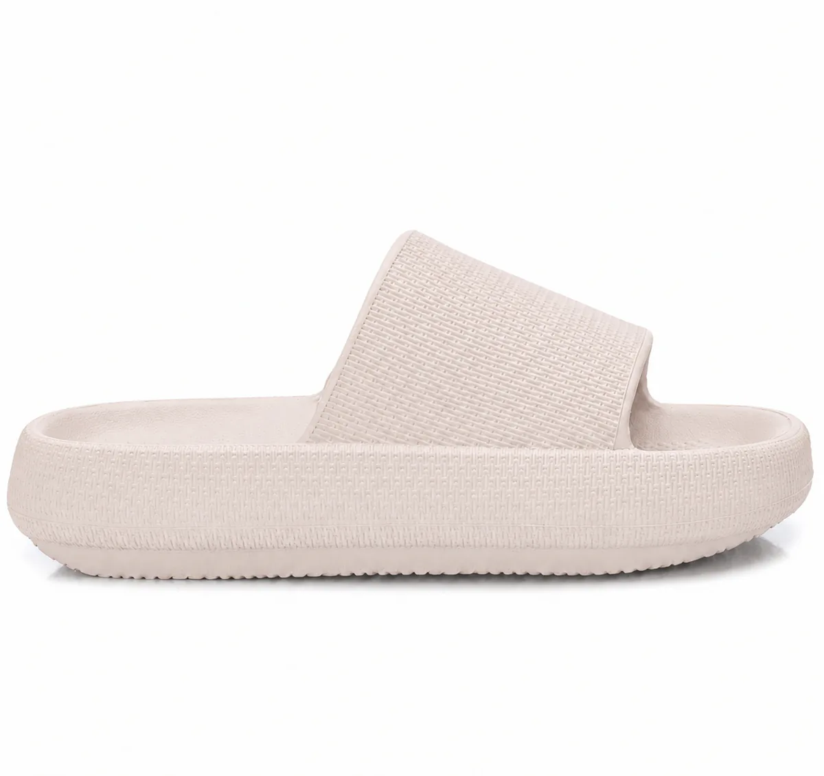 Pantufla tipo nube beige claro con textura en la tira